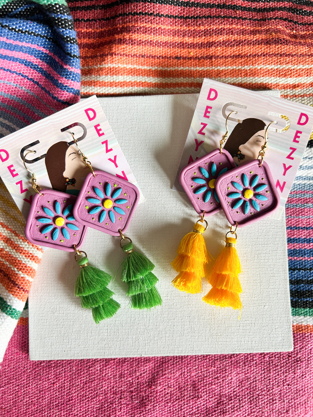 Purple tile with flowers and tassels